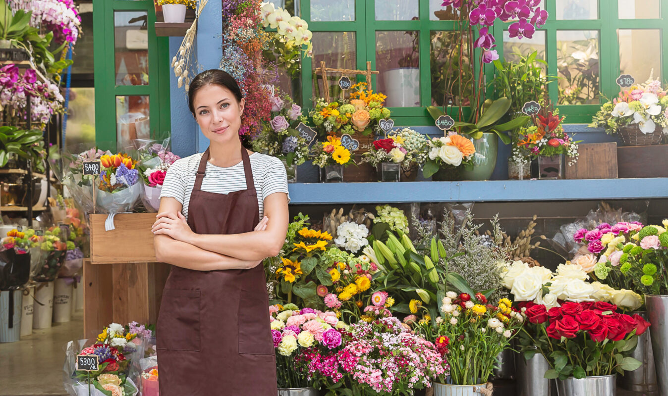 Startup successful sme small business entrepreneur owner asian woman standing with flowers at florist shop. Portrait of caucasian girl successful owner environment friendly concept banner; Shutterstock ID 1531733987; PRJ Reference Code: -; Project Name: -; Line of Business: -; Full Name: -